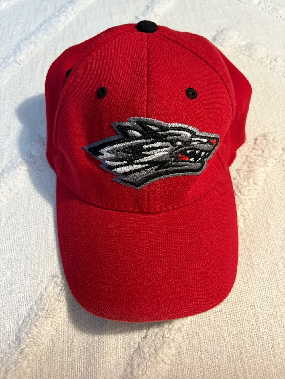 Top of the World Red Baseball Cap with Wolf Logo. New Mexico Lobos